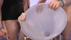 Girl gets pee through a large funnel