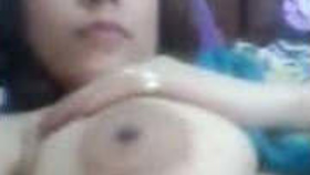 Indian wife reveals her large breasts and intimate area