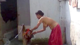 Indian maiden takes a bath
