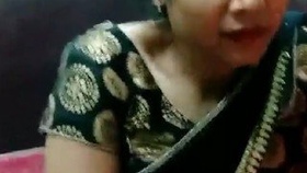 Indian aunty and servant indulge in pleasure together in a group setting