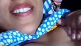 Indian spouse displays her large breasts in this sensual recording