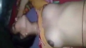 A Bengali wife with large breasts gets pleasure from pressing and being intimate