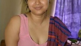 A South Asian wife with large breasts stimulates her husband and he ejaculates on her face