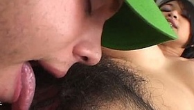 Rare white guy gives oral pleasure to pretty and clean Asian girl's hairy pussy