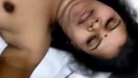 A cute Indian bhabi patiently anticipates a penis