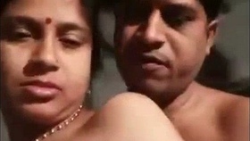 This hot video features a Desi wife's affair with her friend