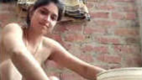 Village beauty bhabi goes topless while bathing