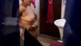 Hidden camera captures secret recording of sultry Indian wife bathing