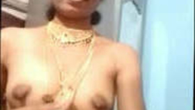 Indian aunt in traditional gold jewelry reveals her breasts and vagina