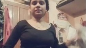 An attractive Indian woman reveals her vagina while menstruating and engaging in conversation with bhabi