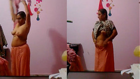 Middle-aged Indian aunt's outfit switch