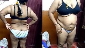 Indian plump aunt performs on stage