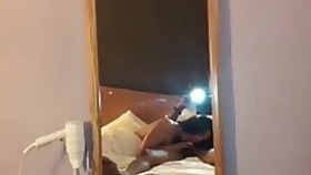 Long haired Indian gal polishes XXX dick in front of mirror