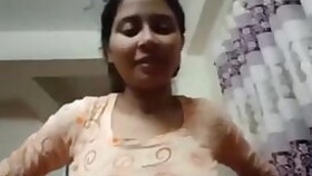 Attractive Indian takes off dress even though the boyfriend films her
