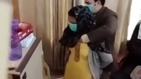 Paki doctor checks boobs by sticking his hands inside her blouse