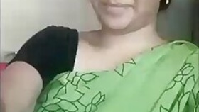 sexy desi bhabhi shows her breasts in a sari