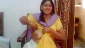 Desi auntie shows off her big tits
